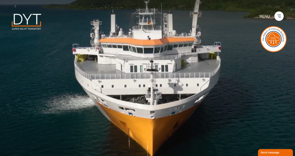 The DYT Yacht Transport homepage on desktop, with a transport vessel at sea as the hero