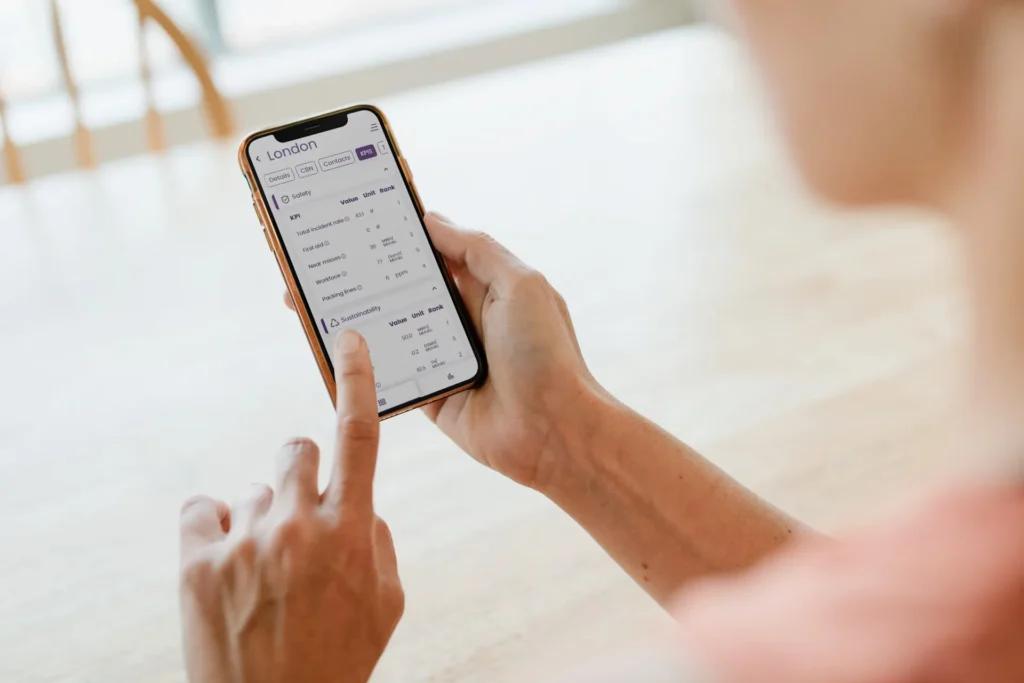 Someone looking at the key figures for a factory on their phone