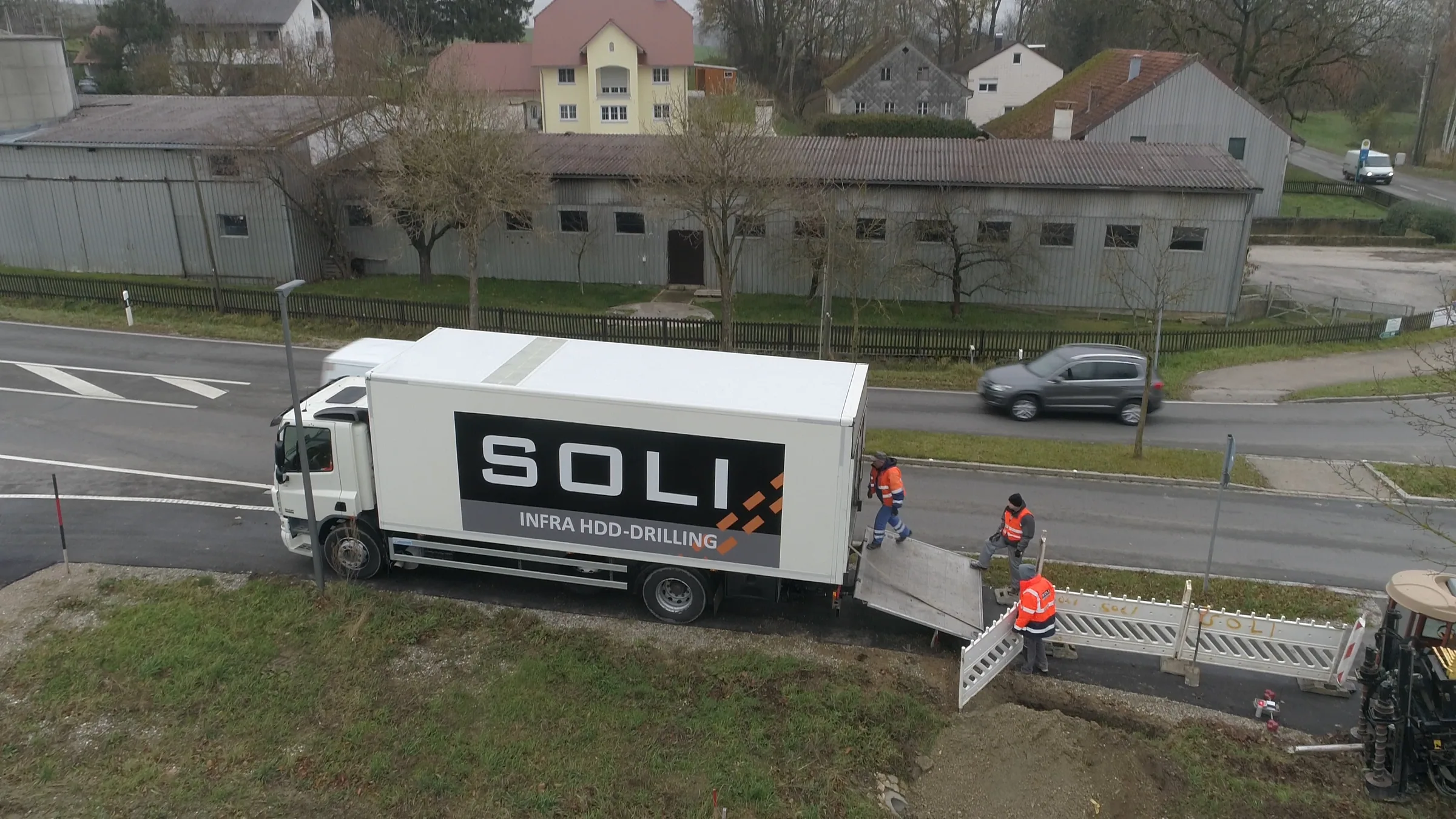 Soli truck on a village street, seen from above